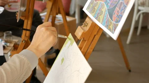 Female artist paints picture artwork in art studio Stock-Footage 59585203