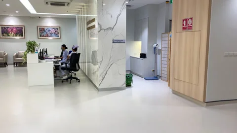 Female Asian Nurses Talk &amp; Sit At Station, Wearing Face Masks, Bangkok Hospital Stock Footage 247390451