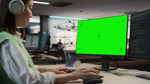 Female Asian Programmer Coding On Chromakey Computer Stock Footage 255795350