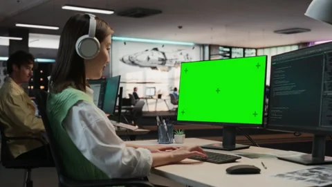 Female Asian Programmer Coding On Chromakey Computer Stock Footage 255795377