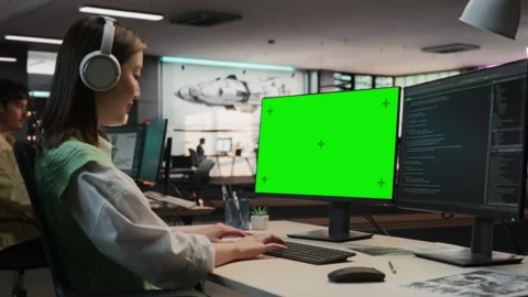 Female Asian Programmer Coding On Chromakey Computer Stock Footage 255795413