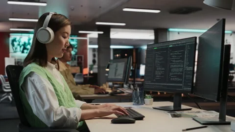 Female Asian Programmer Coding In Game Development Office Stock Footage 255795338