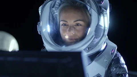 Female Astronaut Wearing Space Suit Works on a Laptop, Exploring New Planet. Stock Footage