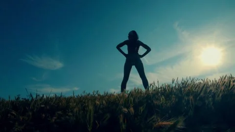 Female Athlete Performs Outdoor Routine at Dusk Stock Footage 312190073