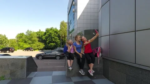 Female athletes after exercise doing SELF Stock-Footage 51605077
