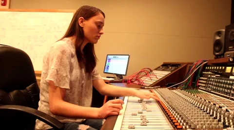 Female Audio Engineer at Console (Color) Video stock 54465497