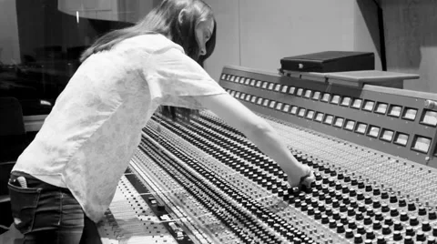 Female Audio Engineer at Recording Console (Black &amp; White) Video stock 54671565