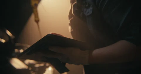 Female Auto Expert Using Tablet For Engine System Calibration Stock Footage 330268901
