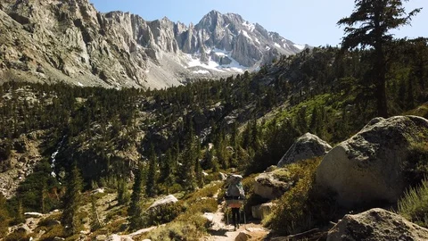 Female Backpacker Hikes on Trail in High Sierra Mountain Range, California Stock Footage 115058932