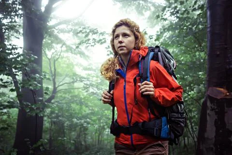 Female backpacking in the forest. 스톡 사진