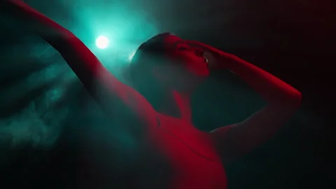 Female ballet dancer performing elements of modern choreography Stock Footage 242509748