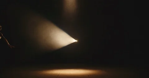 Female ballet dancer performing on spotted stage, douing various movements and Stock-Footage 119280787