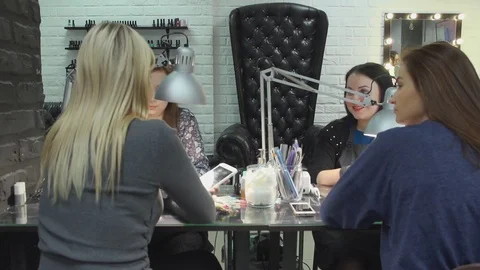 Female beauticians do different procedures and services in beauty salon. Stock Footage 74231955