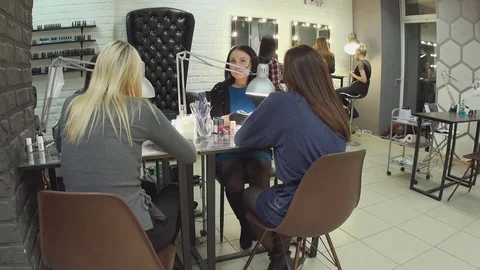 Female beauticians do different procedures and services in beauty salon. Stock Footage 74232109