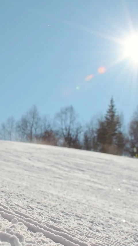 Female beginner skier posing show V symbol playfully love skiing on groomed.. Stock Footage 311873761