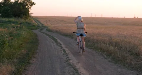 Female with bicycle Stock Footage 138649752