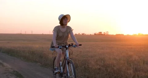 Female with bicycle Stock Footage 138649811