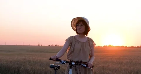 Female with bicycle Stock Footage 138649900