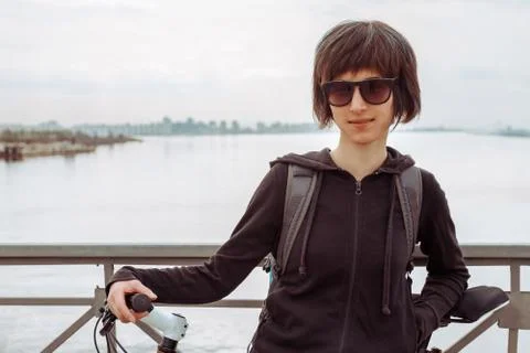 Female with bicycle Stock Photos