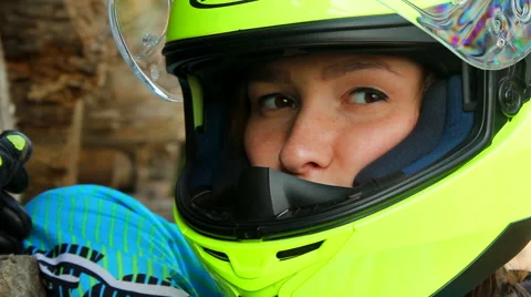 Female Biker in Helmet Posing to the Camera Stock Footage 55320342