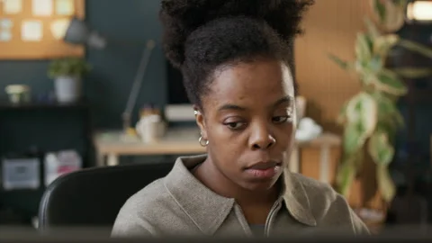 Female Black Software Developer Feeling Tired Working Overtime in Office Stock Footage 306841383