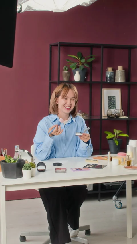 Female Blogger Doing her Make-Up, Recording Beauty Product Commercial in Studio Stock Footage 305032212