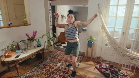 Female Blogger Performing Dance on Camera in the Living Room Stock Footage 259792129