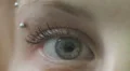 female blue eye - move - open - close - macro HD Footage