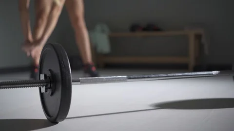 Female bodybuilder doing weightlifting exercises Stock Footage 128676393