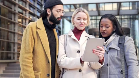 Female boss manager explaining ideas to employees. Business coworkers discussing Stock Footage 220961166