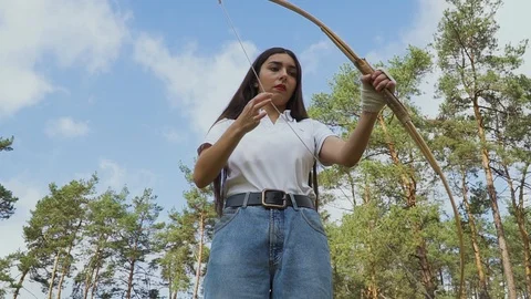 Female bowman checking the string. Stock Footage 96760584