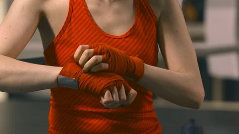 Female boxer preparing for training Stock Footage 89663316
