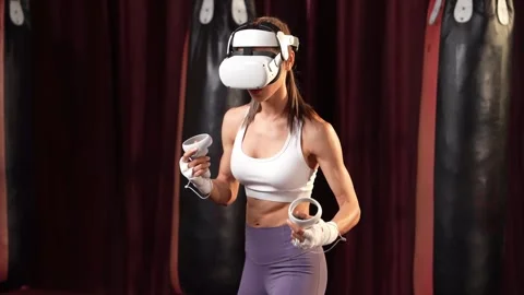 Female boxer training with VR or Stock Video Pond5