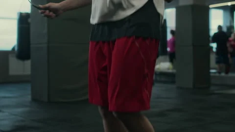 Female Boxer Warming up with Jumping Rope at Gym Stock Footage 277557958