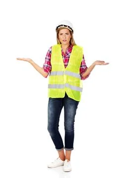 Female builder making do not know sign Female builder making do not know s... Stock Photos