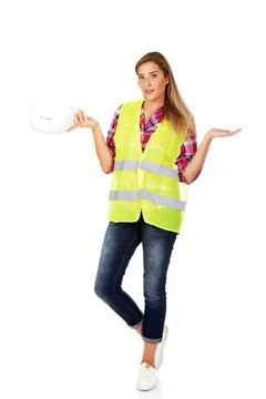 Female builder making do not know sign Female builder making do not know s... Stock Photos