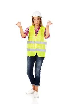 Female builder making do not know sign Female builder making do not know s... Stock Photos