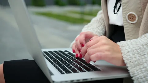 Female business concept, using notebook computer outdoor. woman writing blog. Stock Footage 144175019