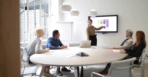 Female business executive giving a presentation Stock Footage