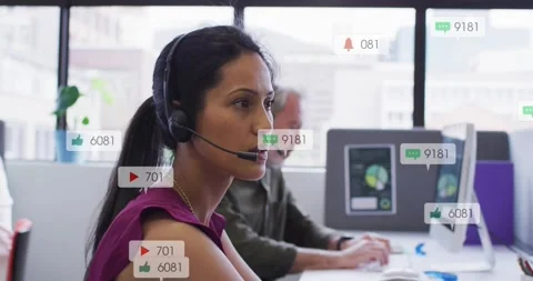 Female call agent handling calls, adjusting headset as notification bubbles Vidéo 331713046