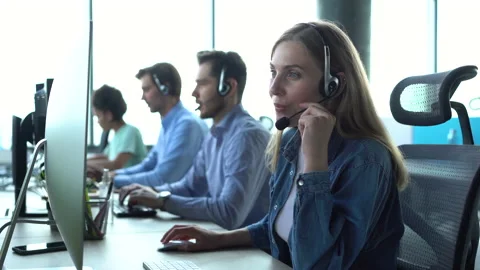 Female call center agent working in customer support service on telesales Stock Footage 157235776