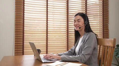 Female call center operator or customer service helpdesk staff. Blithe Stock Footage 256291611