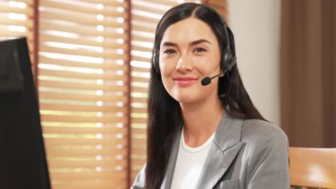 Female call center operator or customer service helpdesk staff. Blithe Stock Footage 257947990