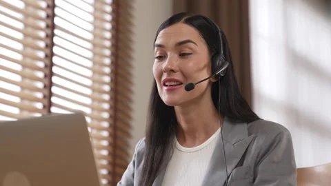 Female call center operator or customer service helpdesk staff. Blithe Stock Footage 261324596