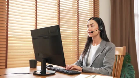 Female call center operator or customer service helpdesk staff. Blithe Stock Footage 262268491