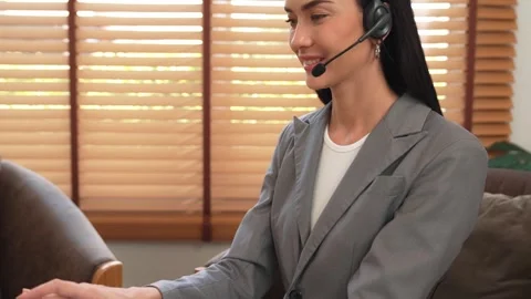 Female call center operator or customer service helpdesk staff. Blithe Stock Footage 262644523