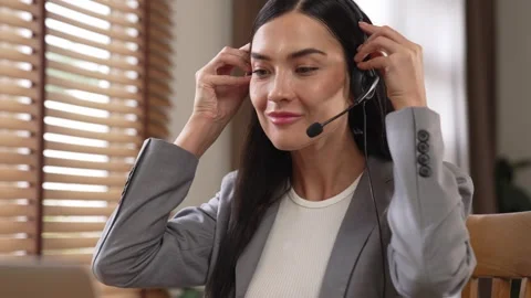 Female call center operator or customer service helpdesk staff. Blithe Video stock 264635606