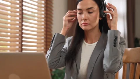 Female call center operator or customer service helpdesk staff. Blithe Stock Footage 264922963