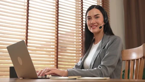 Female call center operator or customer service helpdesk staff. Blithe Stock Footage 265313441