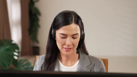 Female call center operator or customer service helpdesk staff. Blithe Video stock 265701468